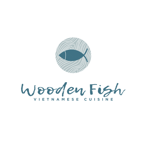 The image features a logo that includes a fish design enclosed within a circle. It is associated with "Wooden Fish VIETNAMESE CUISINE." The logo incorporates elements of typography and graphic design, showcasing text combined with illustrative graphics.